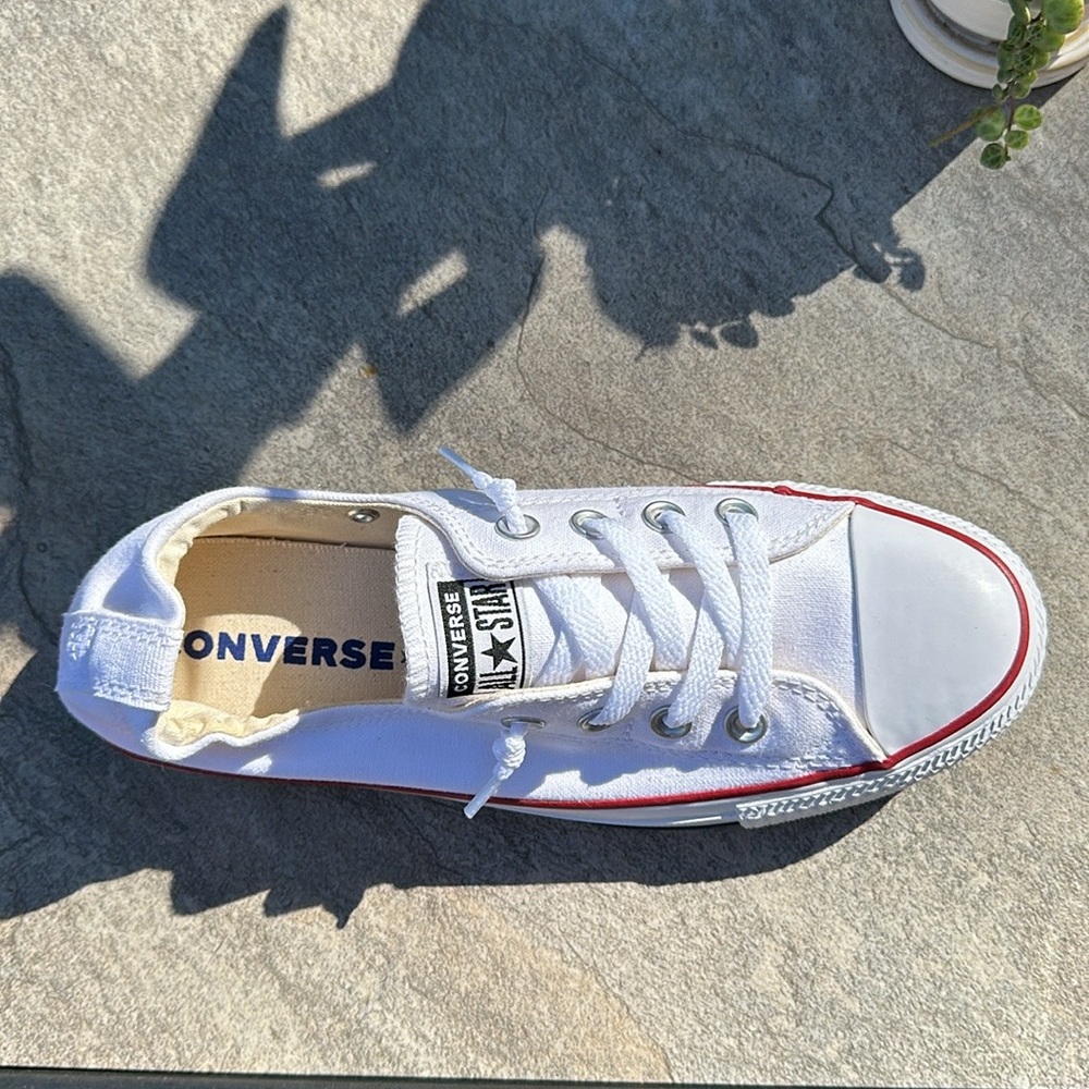 Size 8 white converse, brand new, never worn.